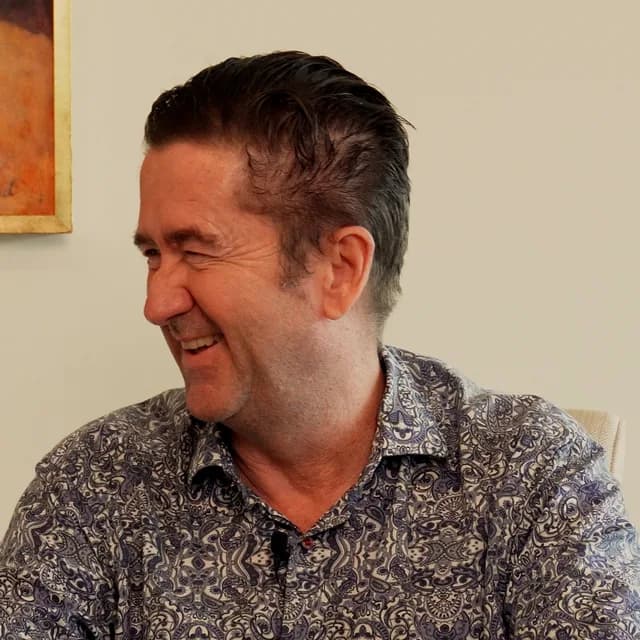 Stephen Van Mil smiling during a recording.